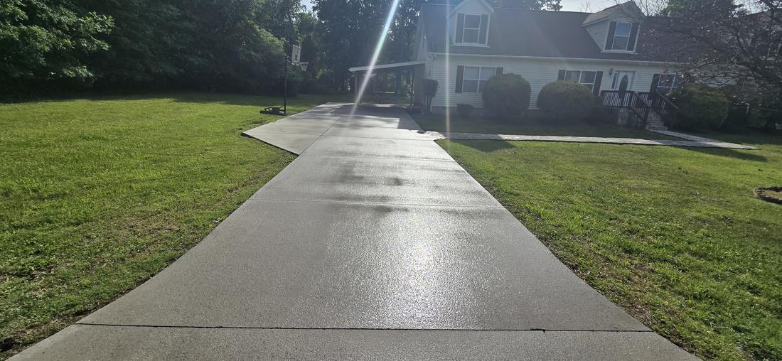 Concrete driveway after professional pressure washing in Eden NC